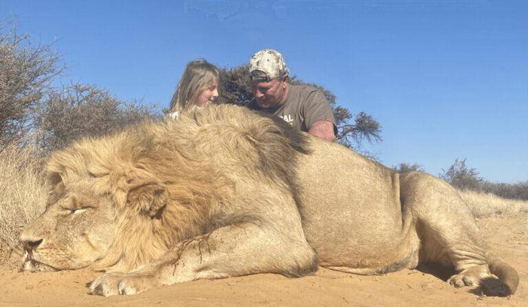Author Pierre van Wyk and his big game hunting prize, an African lion